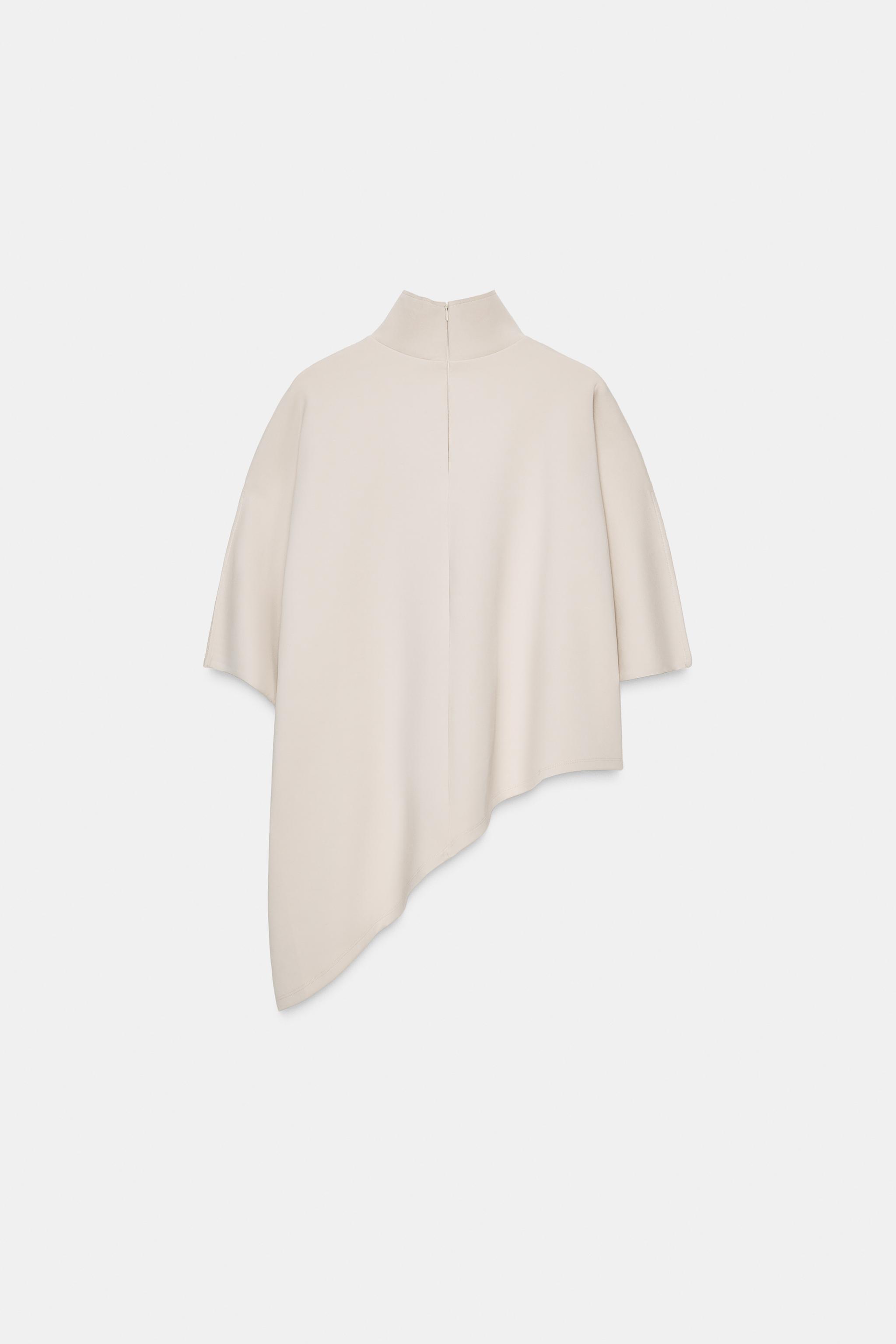 ASYMMETRIC INTERLOCK CAPE